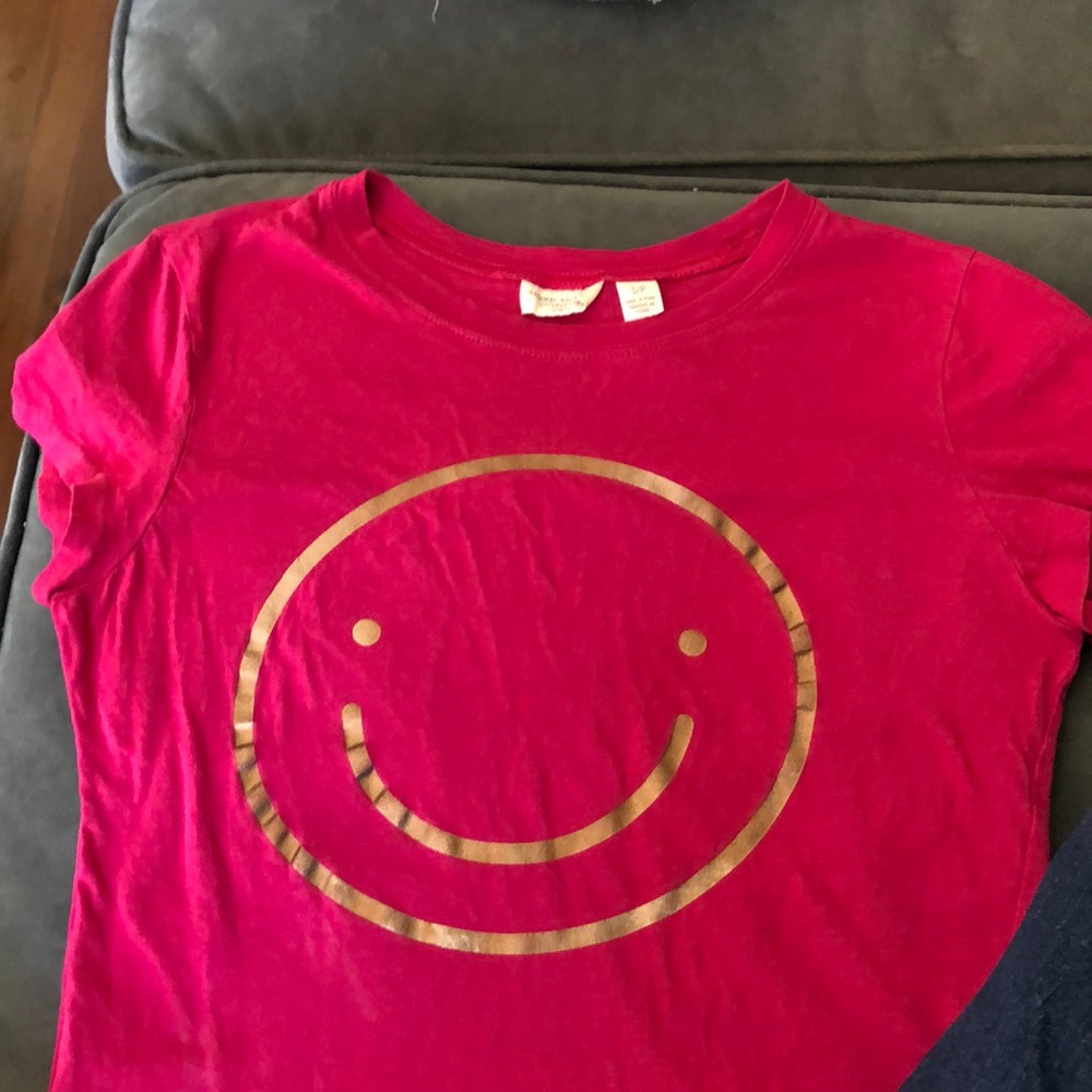 American eagle T smiley face